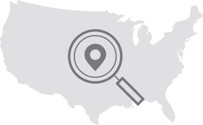 Magnifying glass overlaying a graphic of the United States