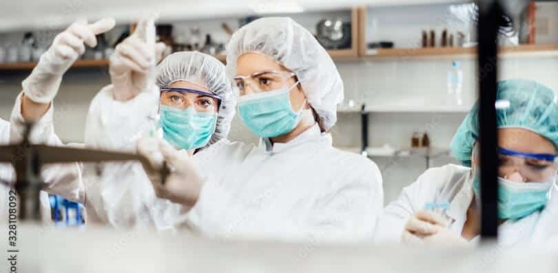 researchers in a lab